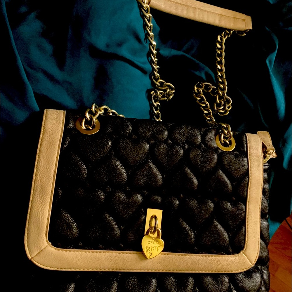 Betsey Johnson bag with hearts. Perfect condition and has pockets.